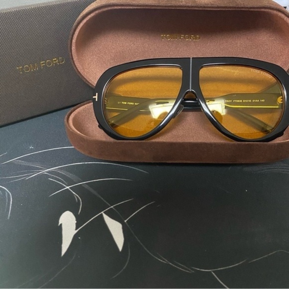 Tom Ford Black Frame Sunglasses with Amber Lenses and Gold Accents